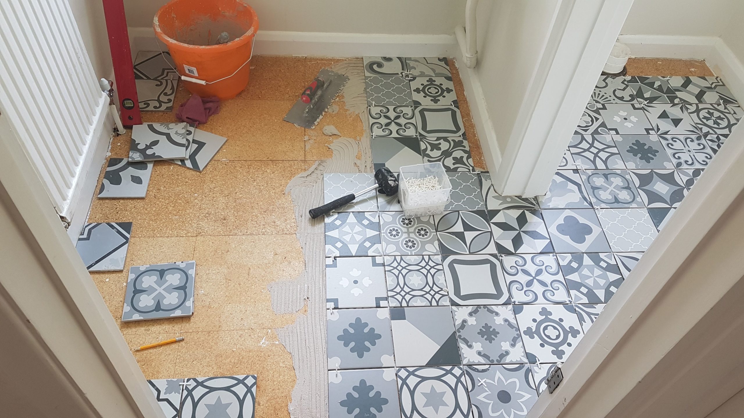 tiling|grey|white|handyman|hammer|bucket